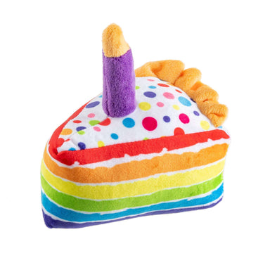 Stuffed dog toy in the shape of a Birthday Cake Slice with a candle included