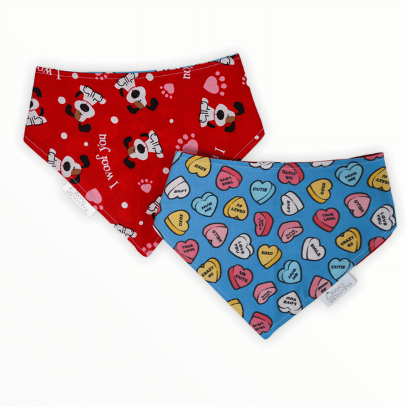 Reversible dog bandana with "I Woof You" written on one side and candy hearts on the other side